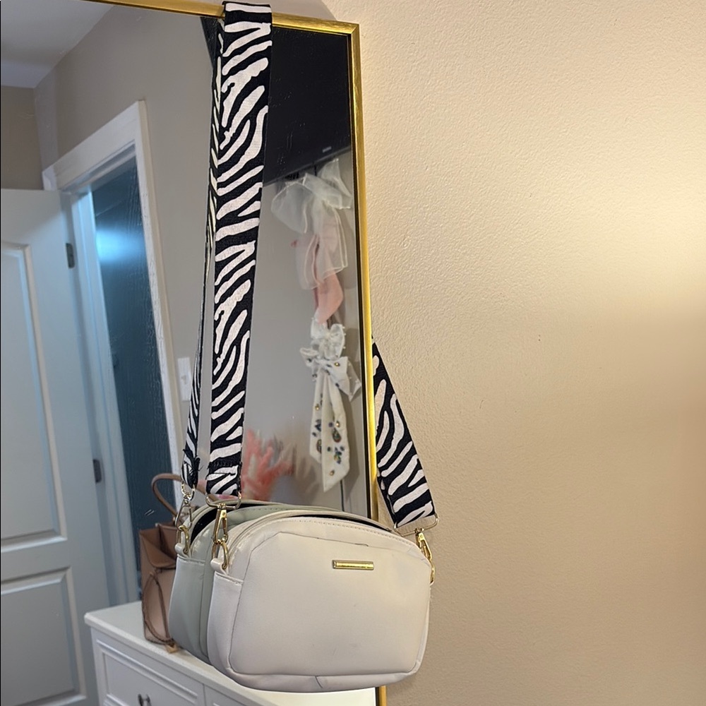 Stylish White Bag with Adjustable Zebra Strap